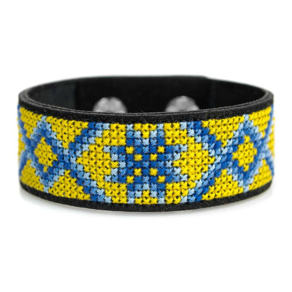 Cross-stitch kits on leather