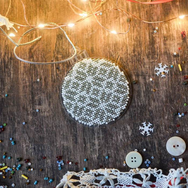 Bead embroidery kit on a plastic base