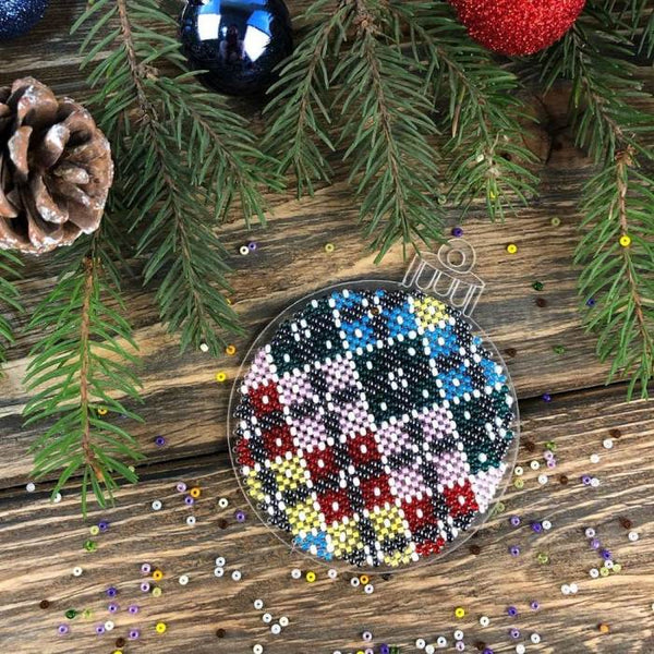 Bead embroidery kit on a plastic base