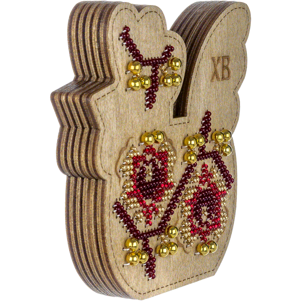 Bead embroidery kit on wood