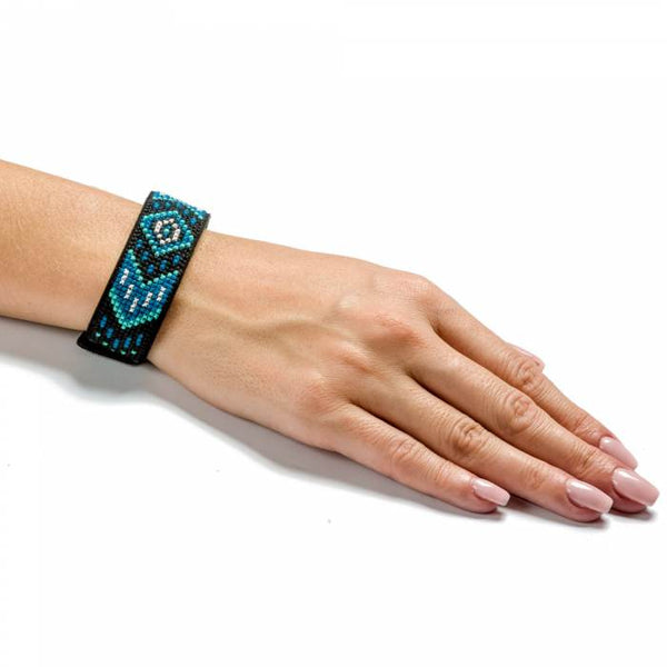 Cross-stitch kits on leather