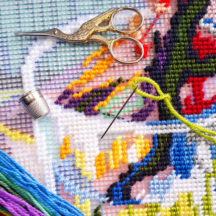 Needlepoint Pillow Kit "Blooming Almond Branch in a Glass with a Book"