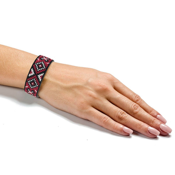 Cross-stitch kits on leather 